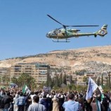 السوريون يحتفلون بذكرى الثورة.. الأهالي للساحات والجيش يرمي الورود والشيباني يغرد (فيديوهات + صور)